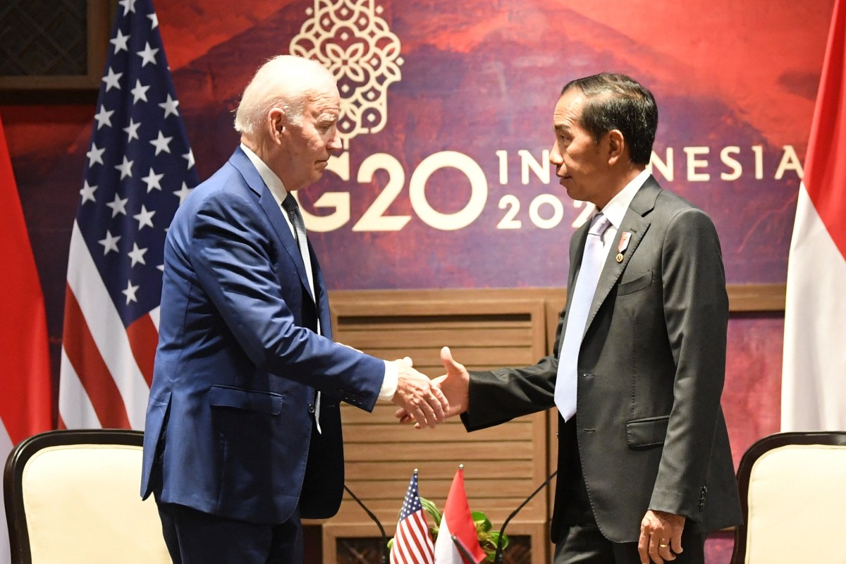 Indonesia’s President Joko Widodo shakes hand with US President Joe Biden during the G20 summit in Bali in November. Will the green energy transition deal announced there come to fruition? Photo: via Reuters