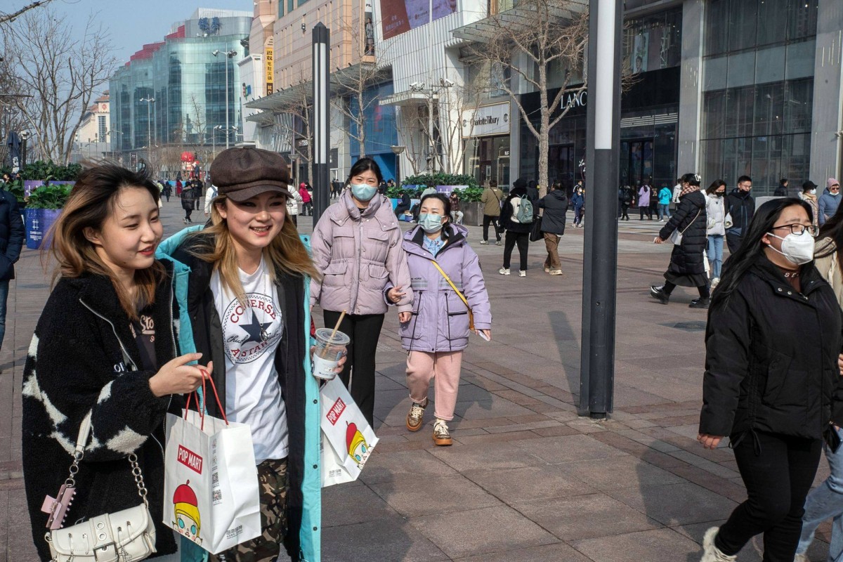 Shoppers in the Wangfujing shopping area in Beijing on February 10. China’s high savings rate and youth unemployment may become stumbling blocks to spending if the economic recovery fails to broaden. Source: Bloomberg