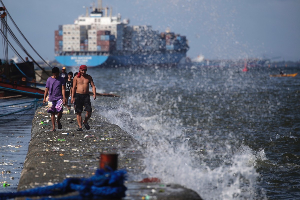 Fishermen in Manila, Philippines. Ocean warming, along with overfishing, has already caused fish stock depletion by between 15 and 35 per cent over the past eight decades. Photo: EPA-EFE