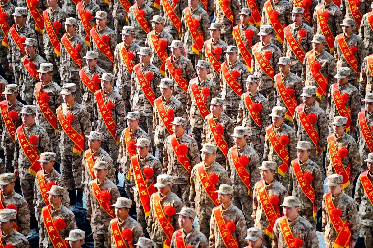 New People’s Liberation Army (PLA) recruits attend a send-off ceremony in China’s Jiangxi province in March. Photo: via Reuters
