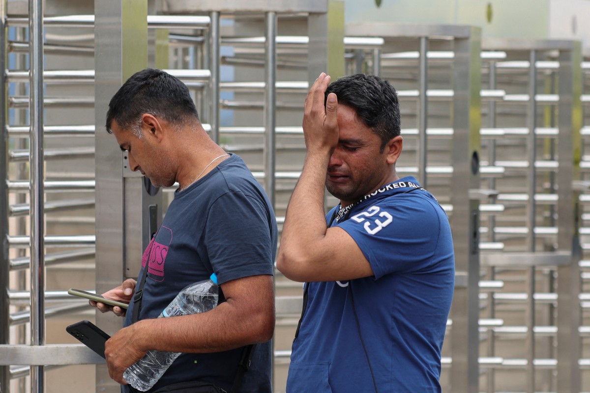 A Pakistani man cries outside a reception and identification camp in Malakasa, Greece, on Monday, following the migrant boat sinking last week. Photo: Reuters