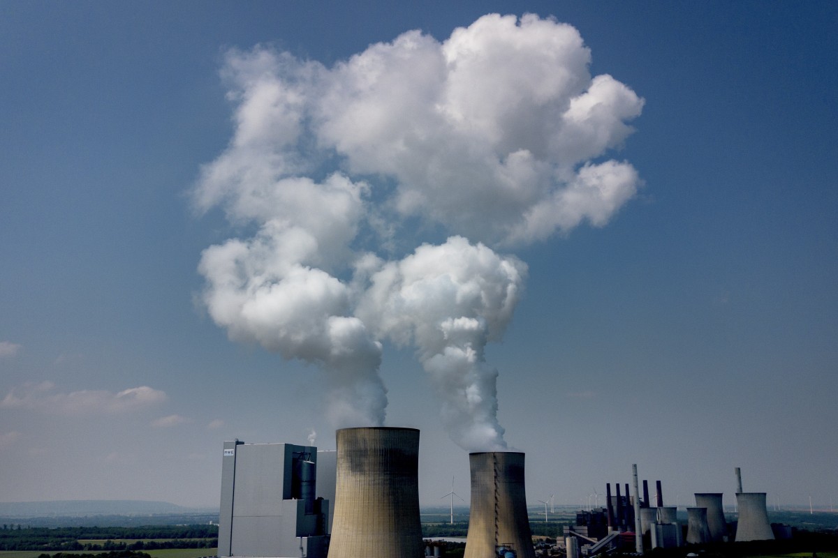 Emissions rise from a coal-fired power plant in Neurath, Germany. The increase in average global temperatures since the advent of industrialisation briefly exceeded 1.5 degrees Celsius in early June. Photo: AP