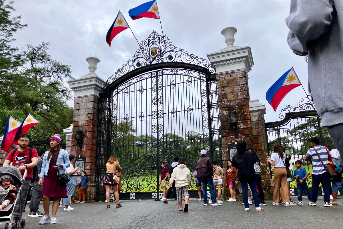 Tourists take pictures outside The Mansion in Baguio, Philippines. Photo: SCMP