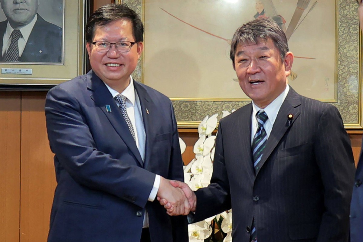 Taiwan’s Vice Premier Cheng Wen-tsan, left, with Japan’s ruling Liberal Democratic Party Secretary General Toshimitsu Motegi. Photo: AFP