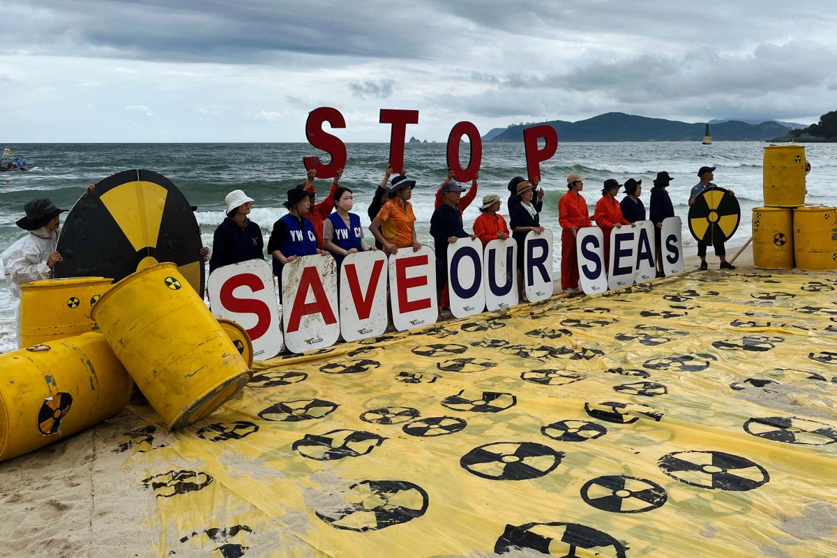 Activists take part in a protest against Japan releasing treated radioactive water from the wrecked Fukushima nuclear power plant into the Pacific Ocean, in Busan, South Korea, on Thursday. Photo: Reuters