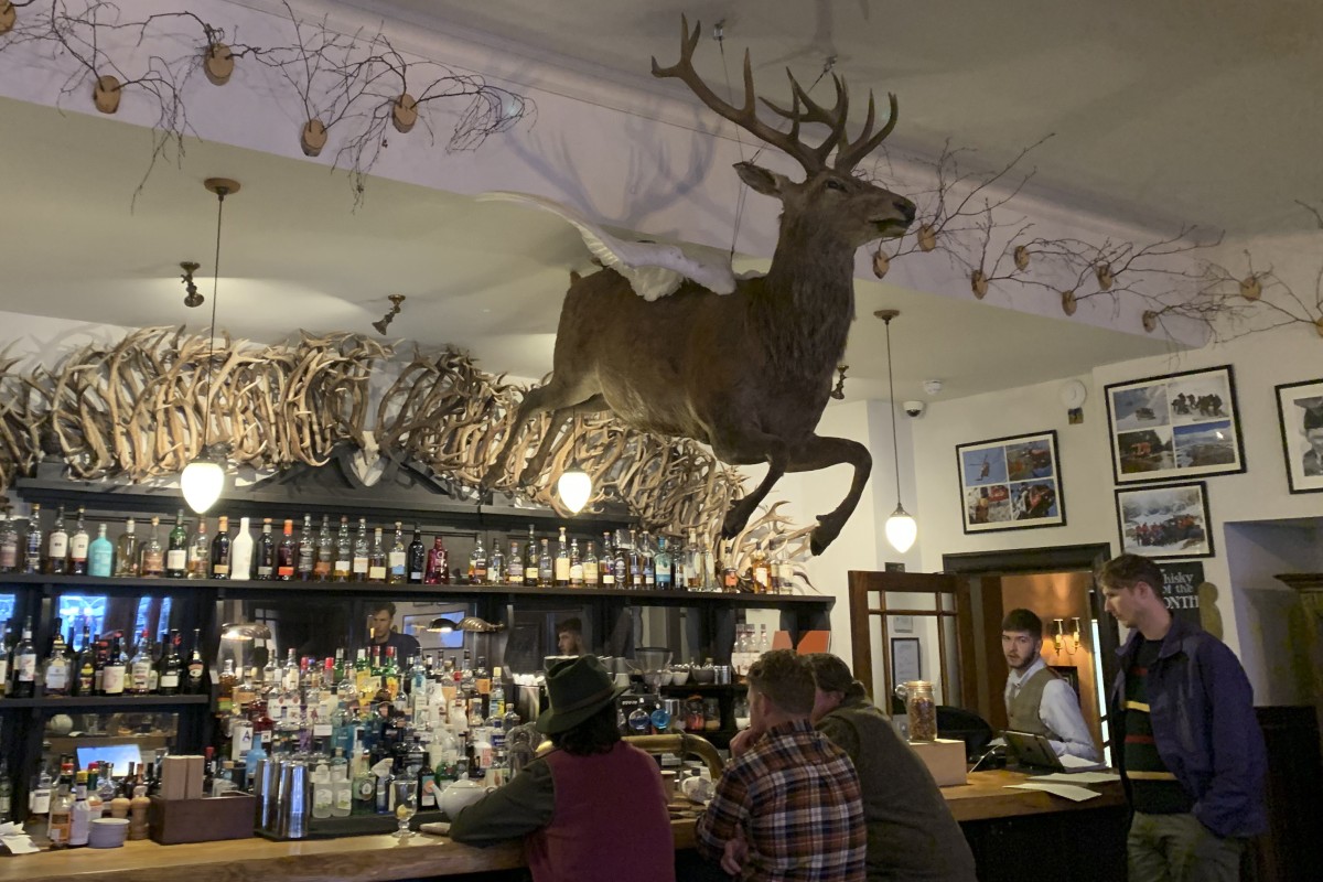 A flying stag above the bar at The Fife Arms hunting lodge in Braemar, Scotland, quirky accommodation designed by Russell Sage that’s a stone’s throw from the royal Balmoral Estate. Photo: Lee Cobaj