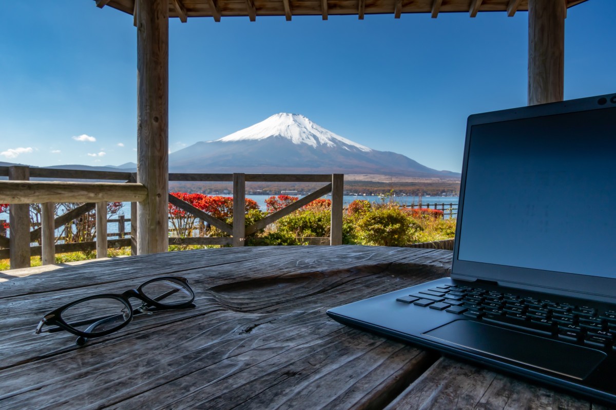 Remote working at a house overlooking Japan’s Mount Fuji. The East Asian nation Japan is looking to appeal to digital nomads who combine work with travel. Photo: Shutterstock 