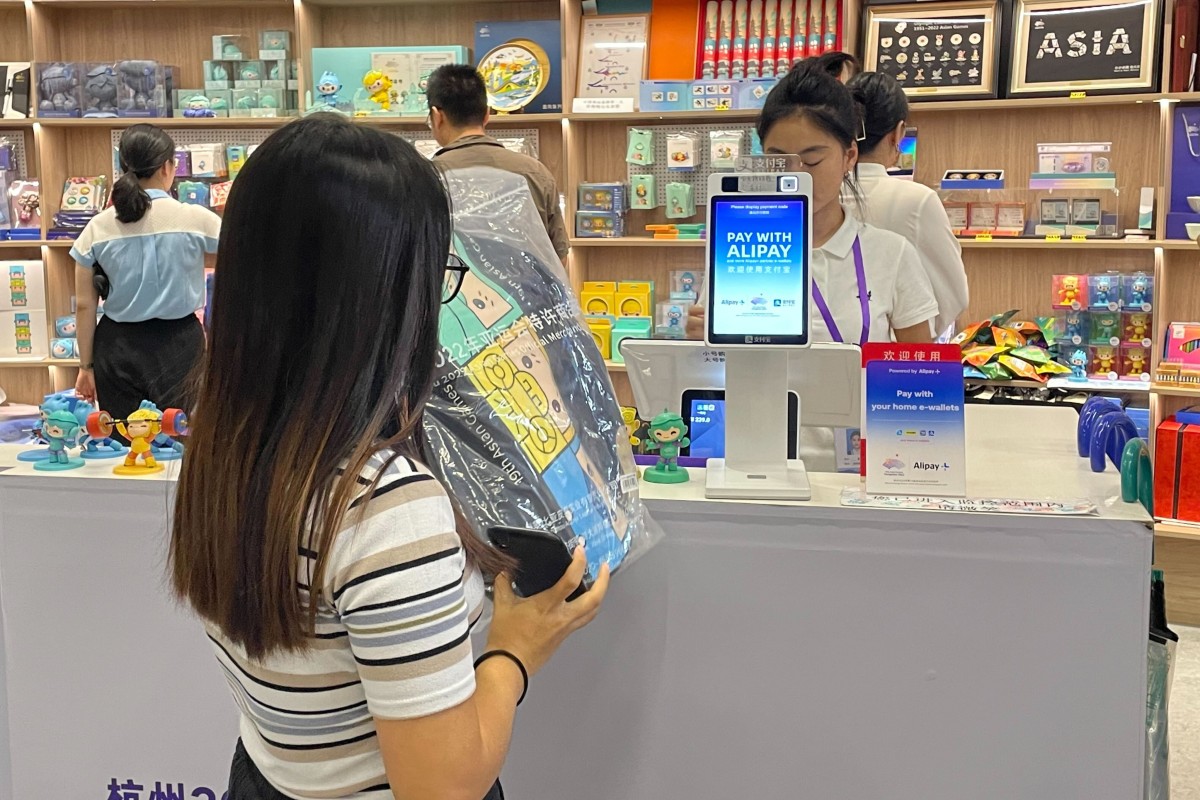 A shopper in Hangzhou, China prepares to pay for an item via cashless transaction. Photo: Tracy Qu