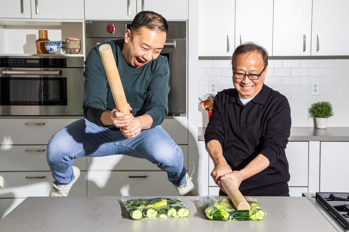 Kevin and Jeffrey Pang having fun  smashing cucumbers for a classic Chinese appetiser. Photo: A Very Chinese Cookbook