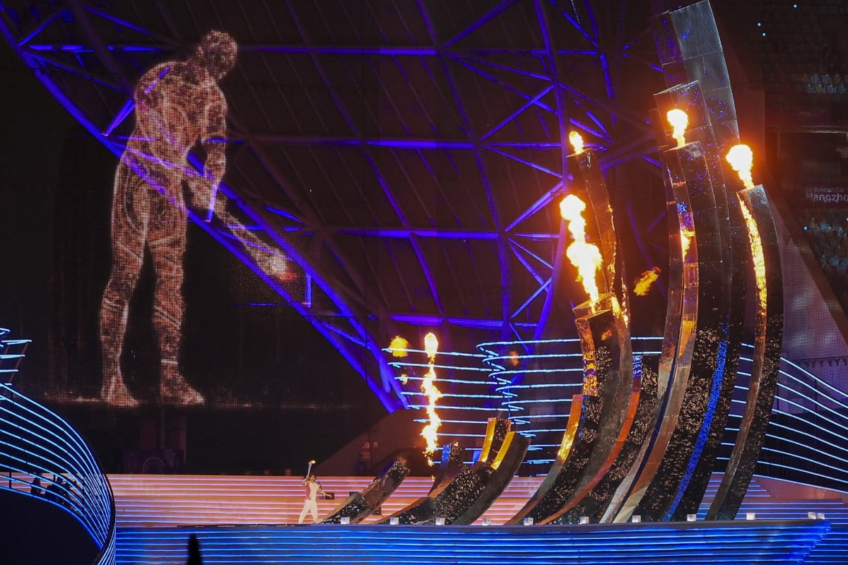 A digital torchbearer lights the cauldron at the opening ceremony of the 19th Asian Games in Hangzhou. Photo: Dickson Lee
