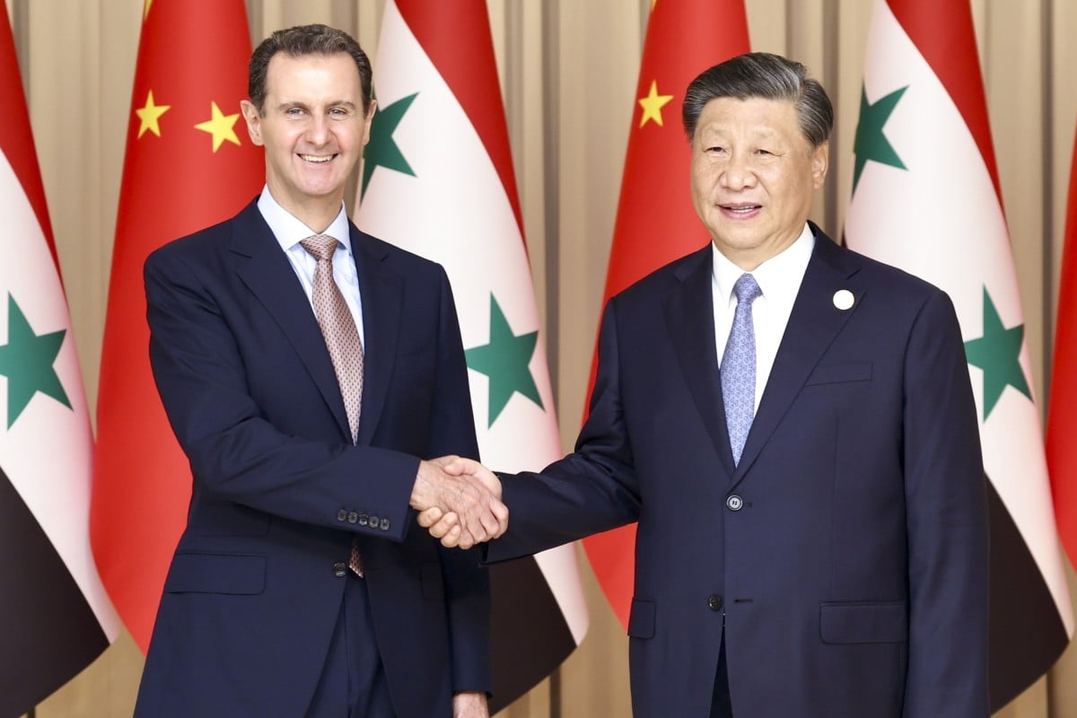 Chinese President Xi Jinping shakes hands with Syrian President Bashar al-Assad in Hangzhou last week. Photo: EPA-EFE