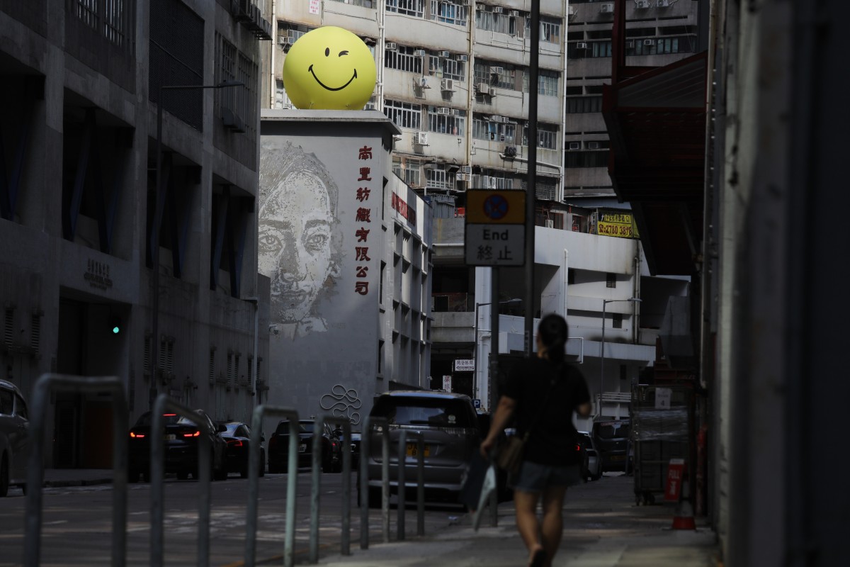 A smiling face sits atop The Mills in Tsuen Wan as a response to World Smile Day and World Mental Health Day in October. Photo: Xiaomei Chen