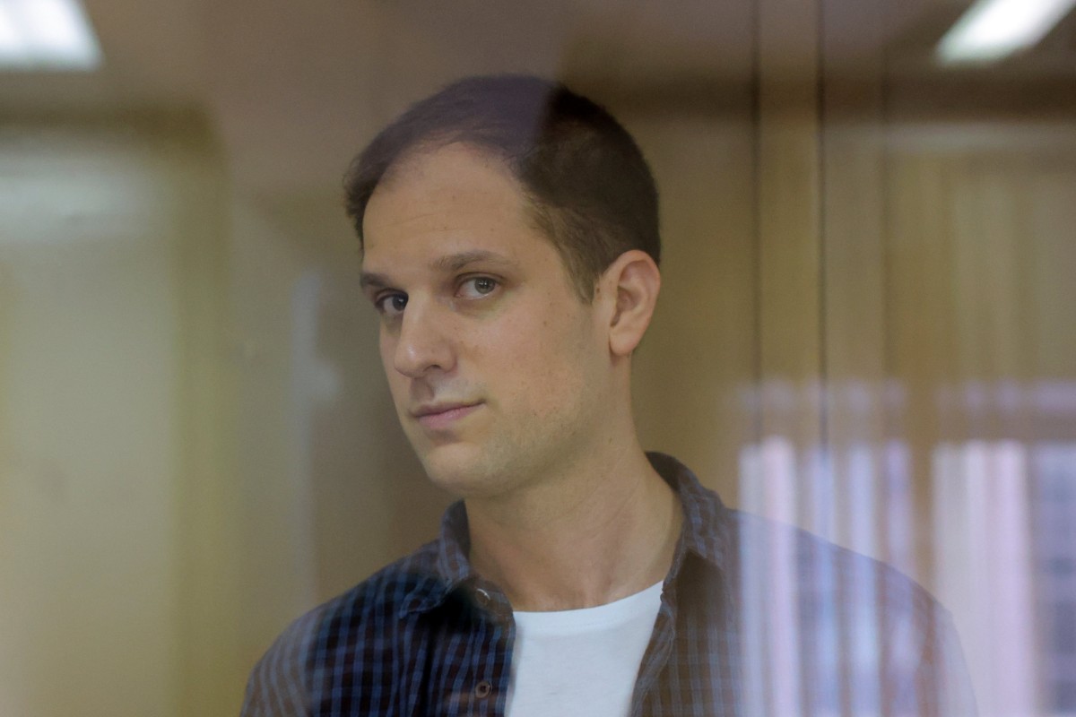 Wall Street Journal reporter Evan Gershkovich stands inside an enclosure for defendants before his appeal against his pre-trial detention on espionage charges in Moscow on Tuesday. Photo: Reuters