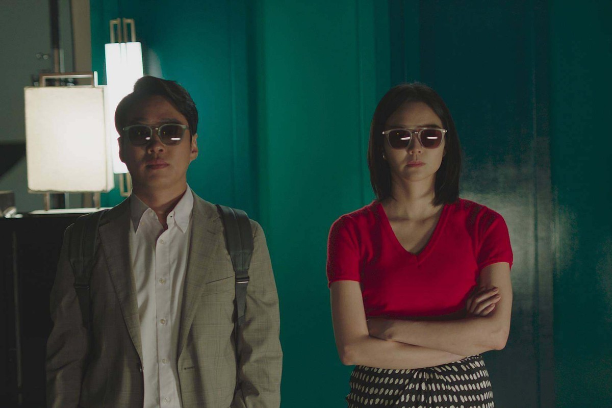 Ahn Jae-hong and Esom as sexless, blackmailing couple Samuel and Woojin, in a still from “LTNS”. The first two episodes of the black comedy, directed by Jeon Go-woon and Lim Dae-hyung, premiered at Busan 2023.