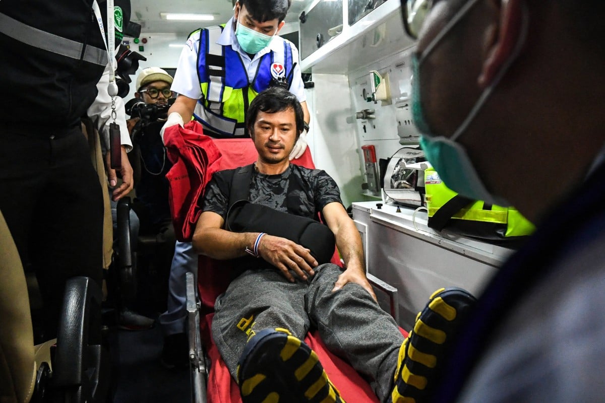 Katchakorn Pudtason, a Thai worker was injured by a surprise attack on Israel by the Palestinian militant group Hamas, is repatriated from Israel at Bangkok’s Suvarnabhumi Airport on Thursday. Photo: Reuters