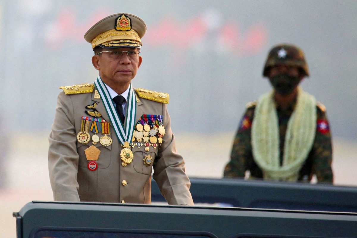 Myanmar’s junta leader General Min Aung Hlaing at an army parade in 2021. Two of his confidantes have been purged for corruption. Photo: Reuters