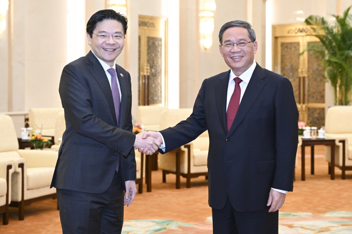 Singapore’s Deputy Prime Minister Lawrence Wong meets Chinese Premier Li Qiang in Beijing on May 16. Photo: Xinhua