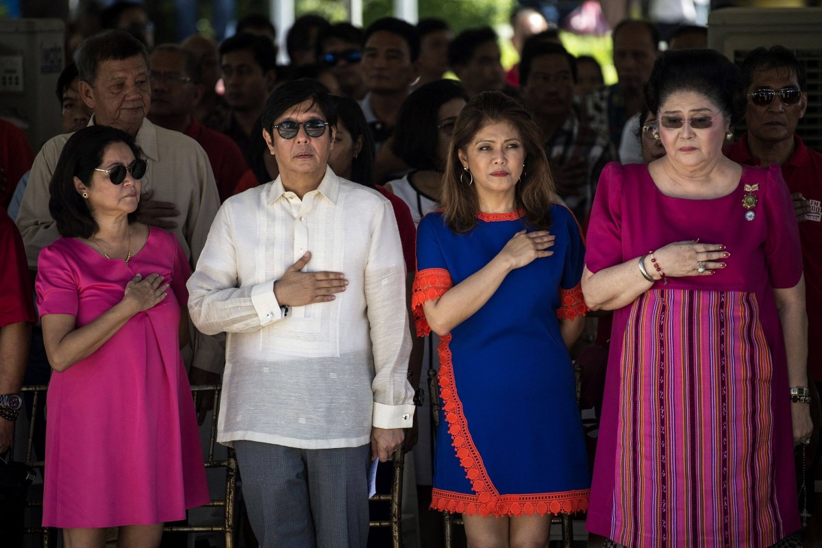 (From left) Louise “Liza” Araneta-Marcos, wife of President Ferdinand Marcos Jnr, President Marcos Jnr, his sister Imee and their mother, former Philippine first lady Imelda Marcos attend a wreath-laying ceremony at a monument to late dictator Marcos Snr. Photo: AFP