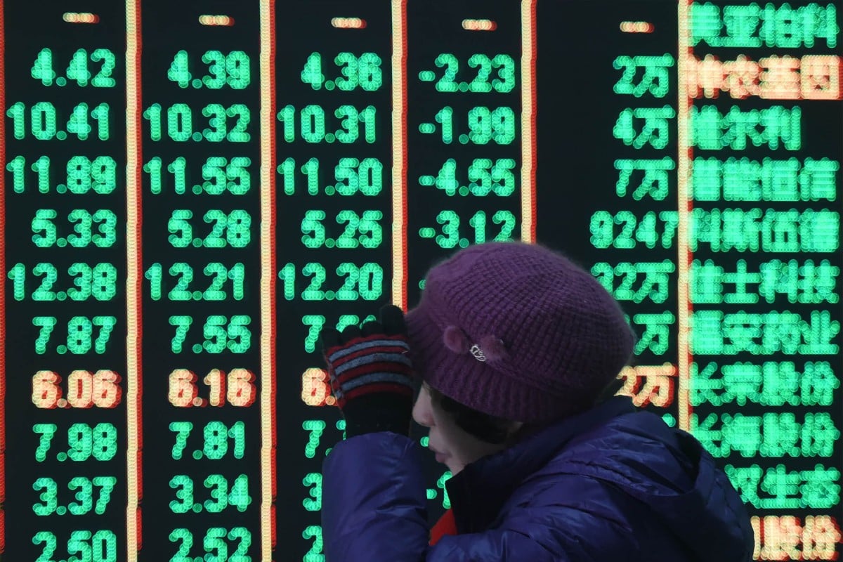 A customer pays attention to the Chinese market at a stock exchange in Hangzhou in eastern Zhejiang province on February 5. Photo:  CFOTO/Future Publishing via Getty Images