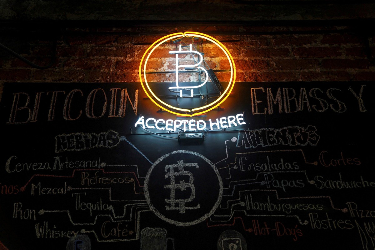 A neon logo of virtual cryptocurrency bitcoin is seen at the Bitcoin Embassy bar, June 1, 2021. Photo: Reuters