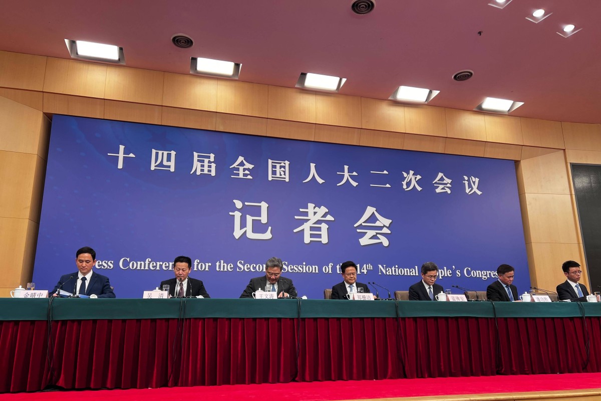 China’s finance, commerce, banking, development and securities heads face the press in Beijing during the annual “two sessions”. Photo: Mia Nulimaimaiti