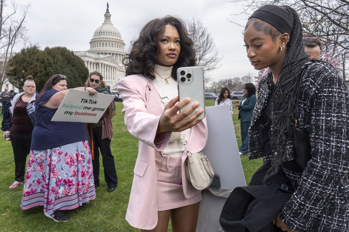 TikTok devotees Mona Swain (centre) and her sister Rachel, both of Atlanta, monitor voting at the Capitol in Washington, as the House passed the TikTok bill on March 13. Photo: AP