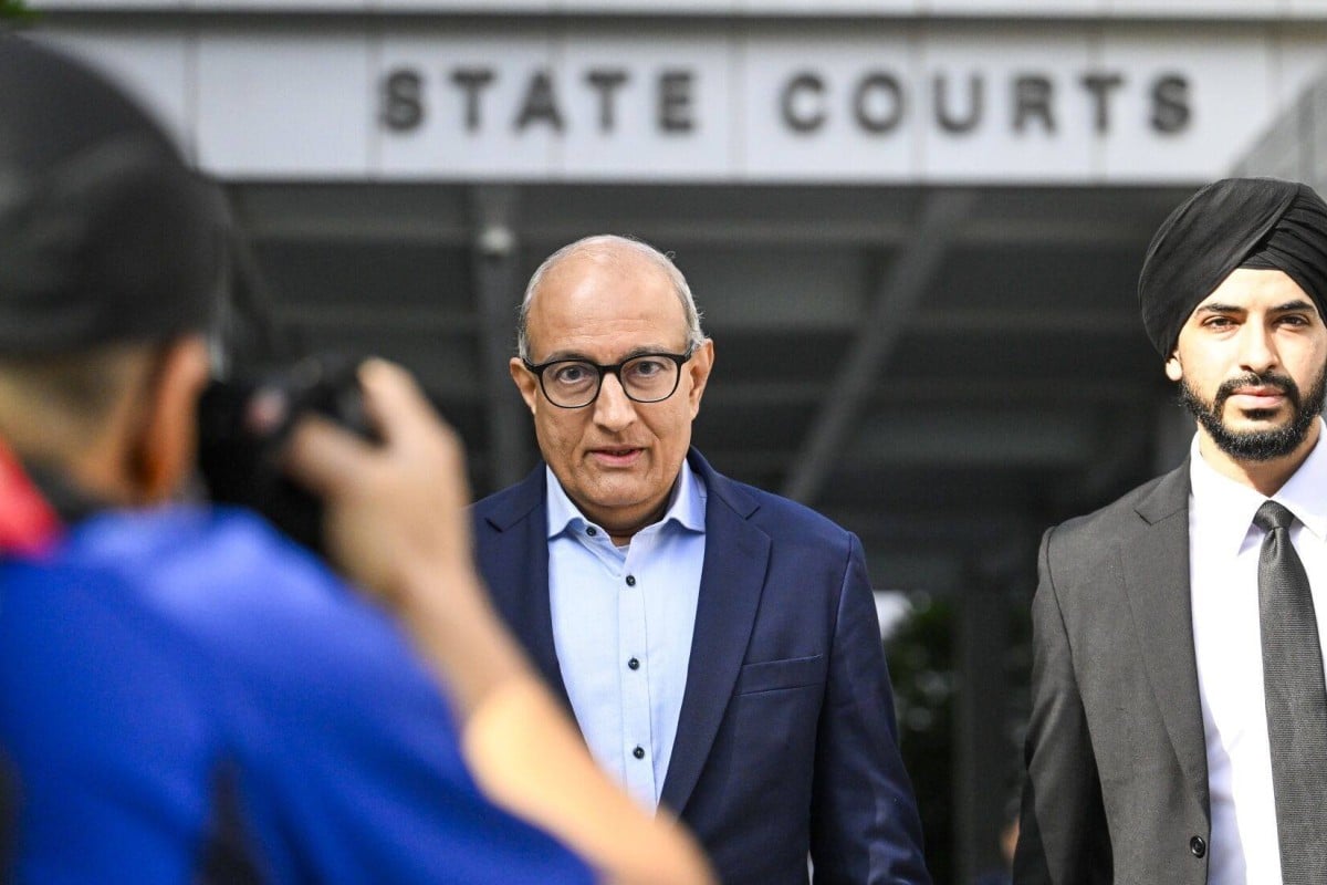 S. Iswaran, Singapore’s former transport minister (centre)  leaves the Singapore State Courts on Monday after more corruption charges were filed against him. Photo: Bloomberg