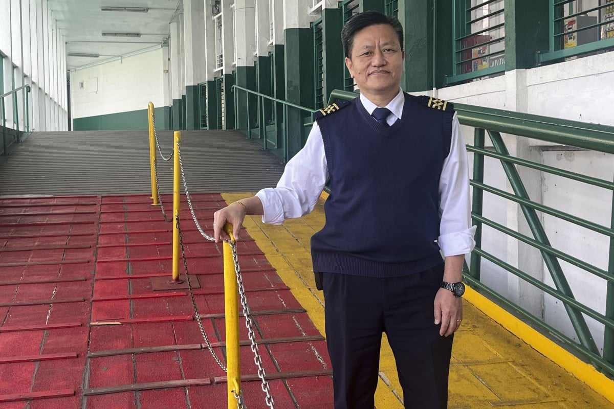 Hong Kong Star Ferry Company’s chief coxswain, Kwok Cho-tai, at the pier in Tsim Sha Tsui. He opens up about growing up poor but happy on a boat, and his career aboard one of Hong Kong’s icons. Photo: Kate Whitehead