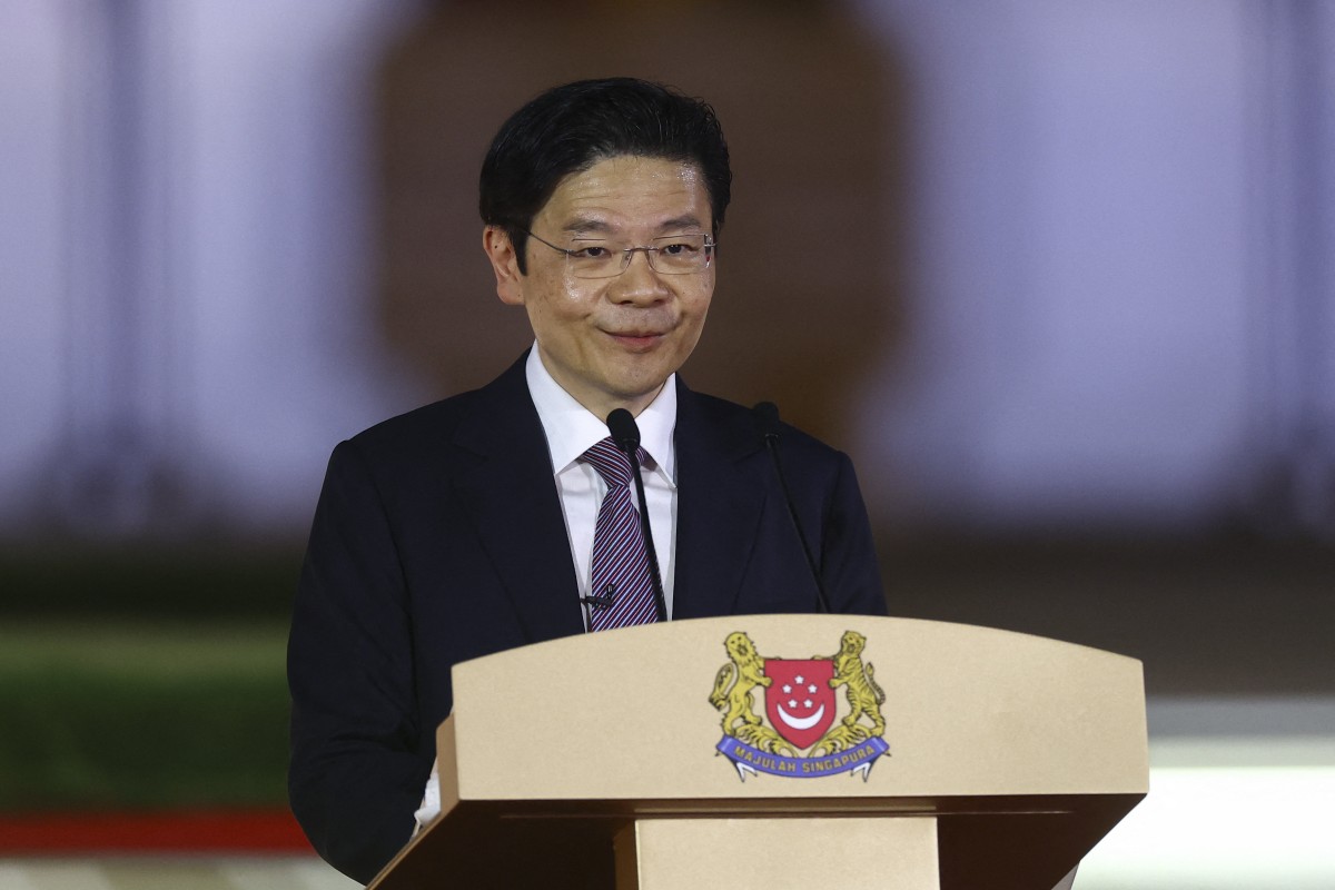 Singapore’s new leader Lawrence Wong makes a speech after being sworn in at the Istana. Photo: AFP