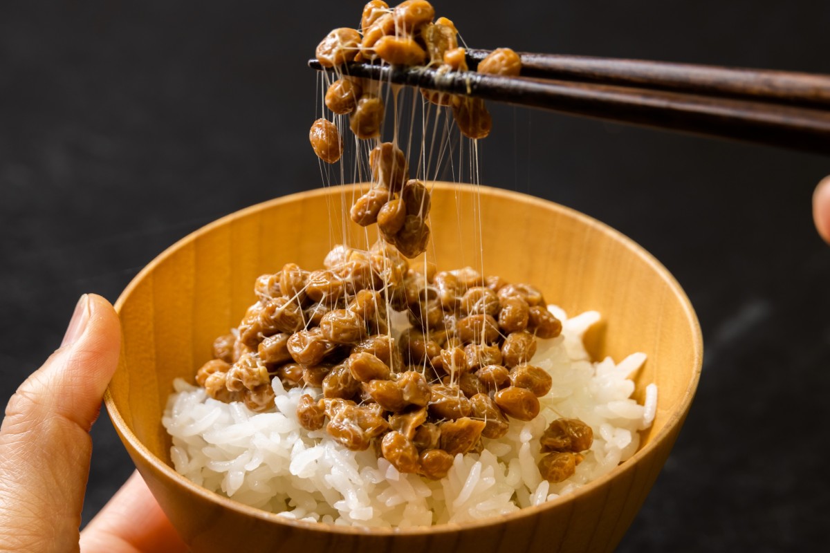 Natto is widely consumed in Japan as a budget superfood, but the fermented soybeans’ pungent aroma and wildly sticky texture are not for everyone. Photo: Shutterstock