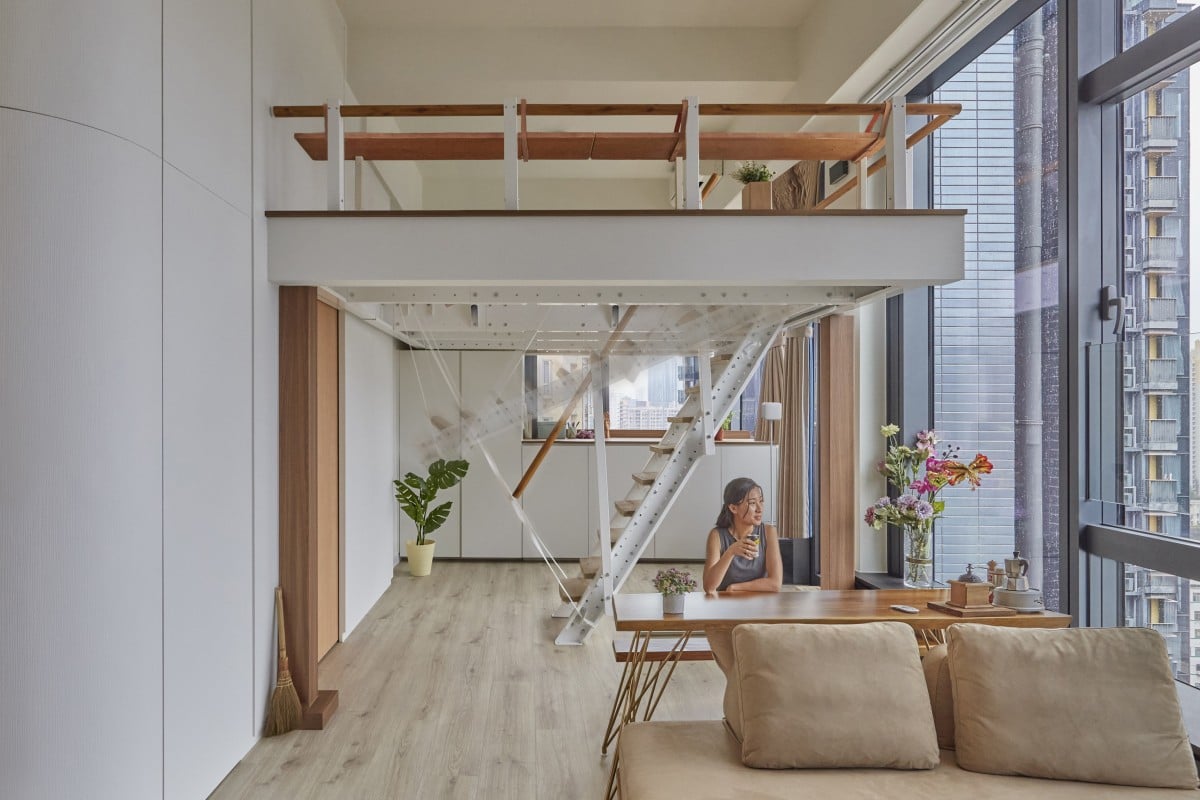 Patrick Lam, of Sim-Plex Design Studio, built an elevated sleeping platform in this 400 sq ft Kowloon apartment. Photo: Sim-Plex Design Studio.  