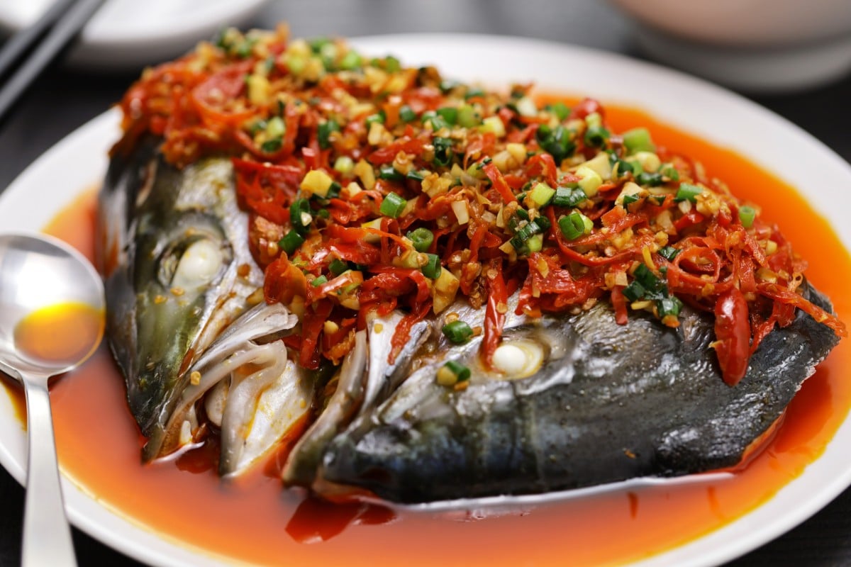 Steamed fish head with chopped hot red peppers. Photo: Shutterstock