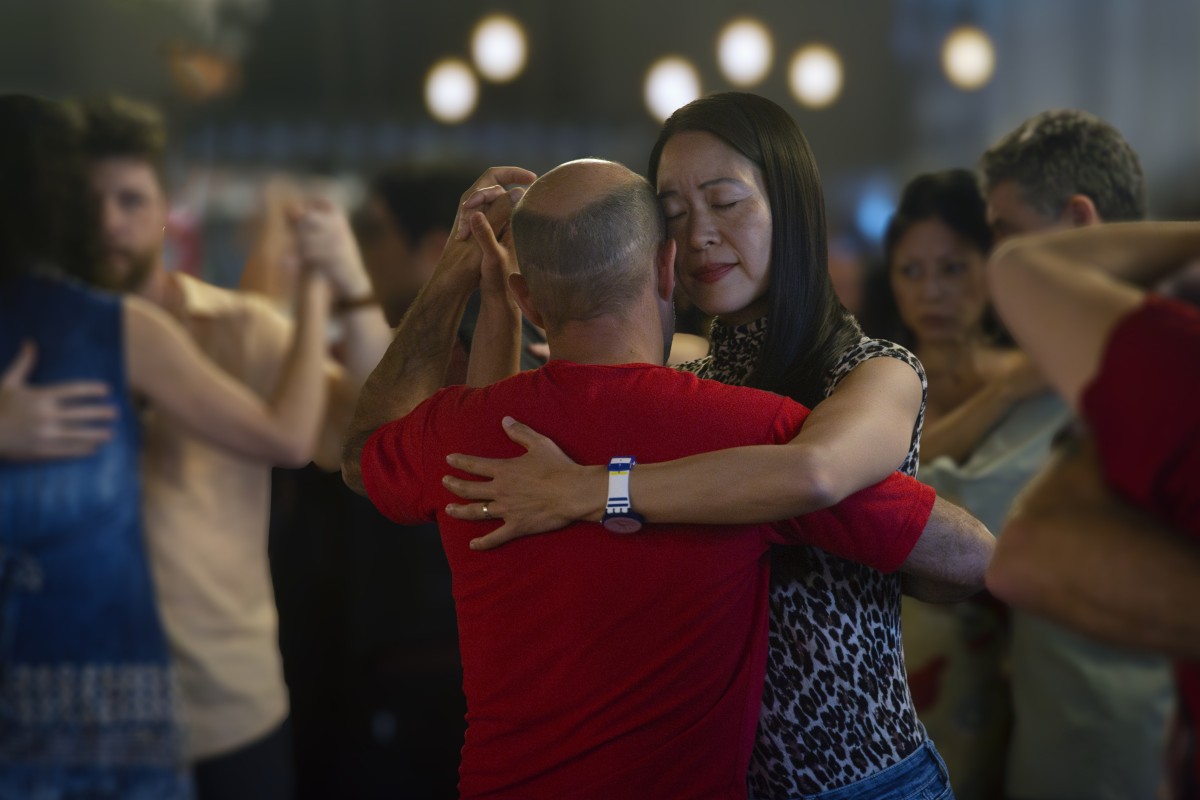 Naomi Hotta is one of a number of Asian women who have spent time navigating the codes of the often seedy world of Buenos Aires’ milongas, but here she enjoys returning to the floor at a relatively relaxed afternoon dance. Photo: Kicci Tommasi