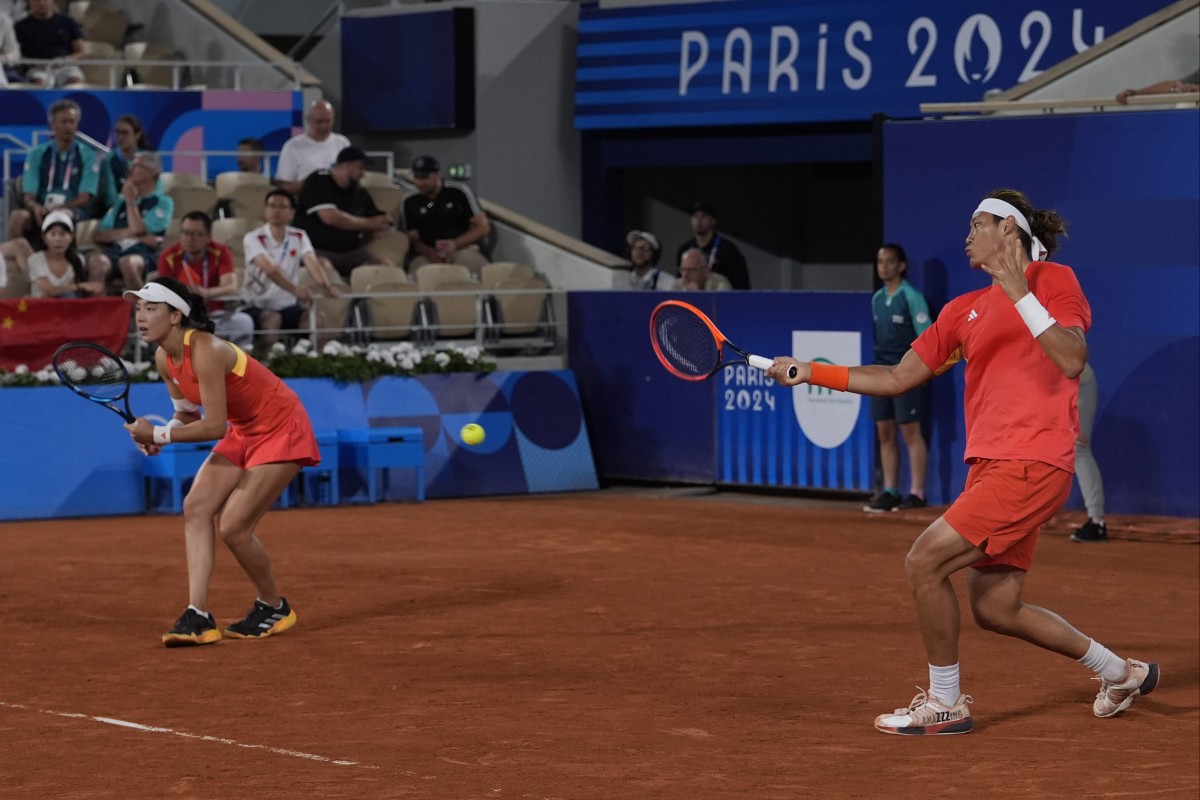 China’s Wang Xinyu (left) and Zhang Zhizhen in action during the mixed doubles final at Roland Garros. Photo: AP