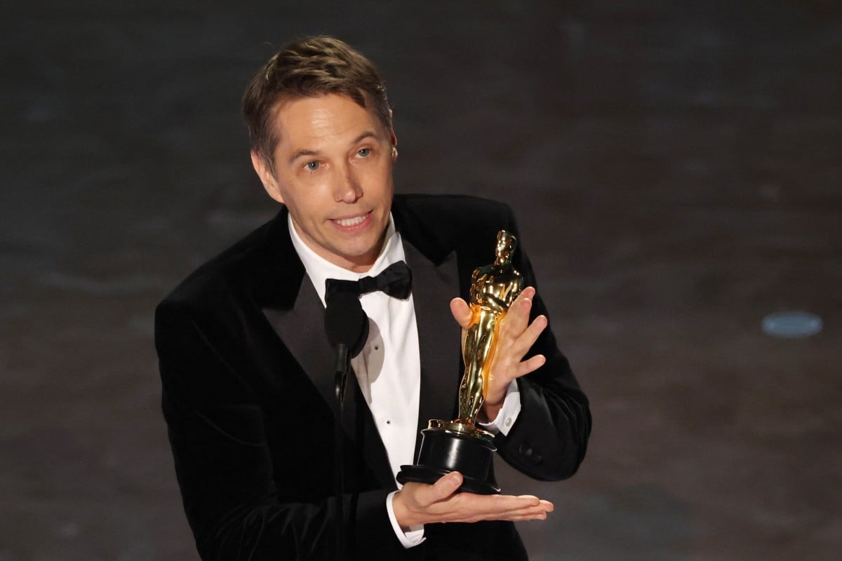 Sean Baker with his Oscar for best film editing for Anora. It was soon capped by his wins for best director and then best picture, taking his personal tally for the night to four. The film’s star, Mikey Madison, scored an upset best actress win. Photo: Reuters