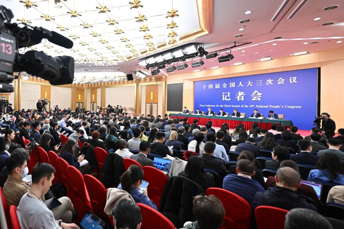The heads of China’s major economic institutions held a press conference on the sidelines of the “two sessions”. Photo: Xinhua