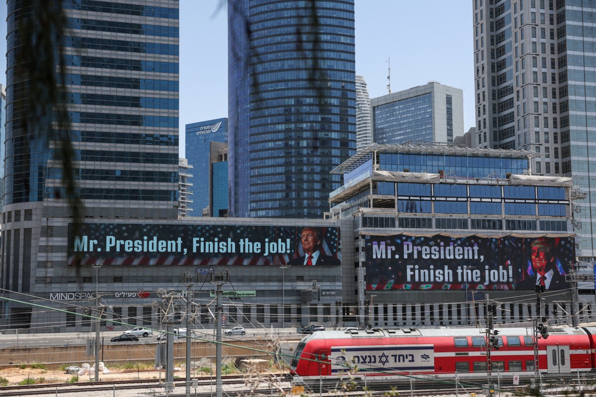US President Donald Trump on giant billboards in Tel Aviv, Israel. Photo: Reuters