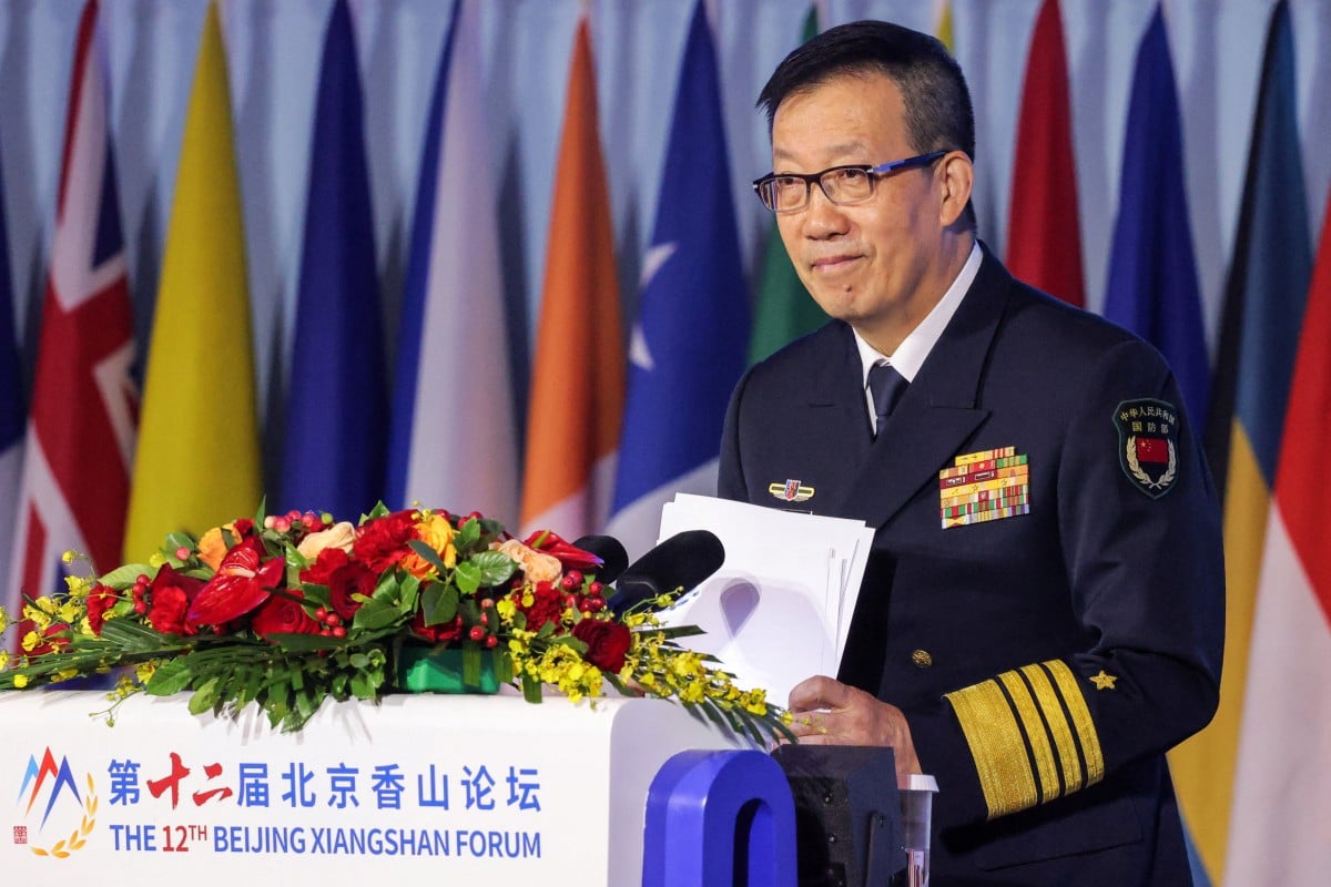 Chinese Defence Minister Dong Jun addresses the Beijing Xiangshan Forum on Thursday. Photo: Reuters