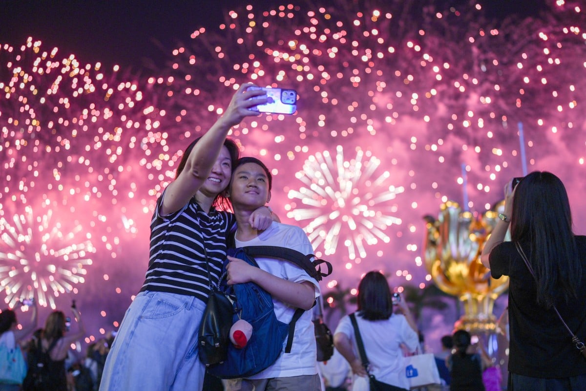 Hong Kong’s National Day fireworks display makes a great backdrop for a selfie. Photo: Eugene Lee