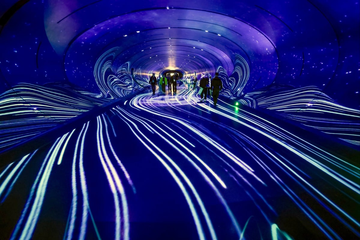 Dark tunnel with sci-fi and astronomical projections