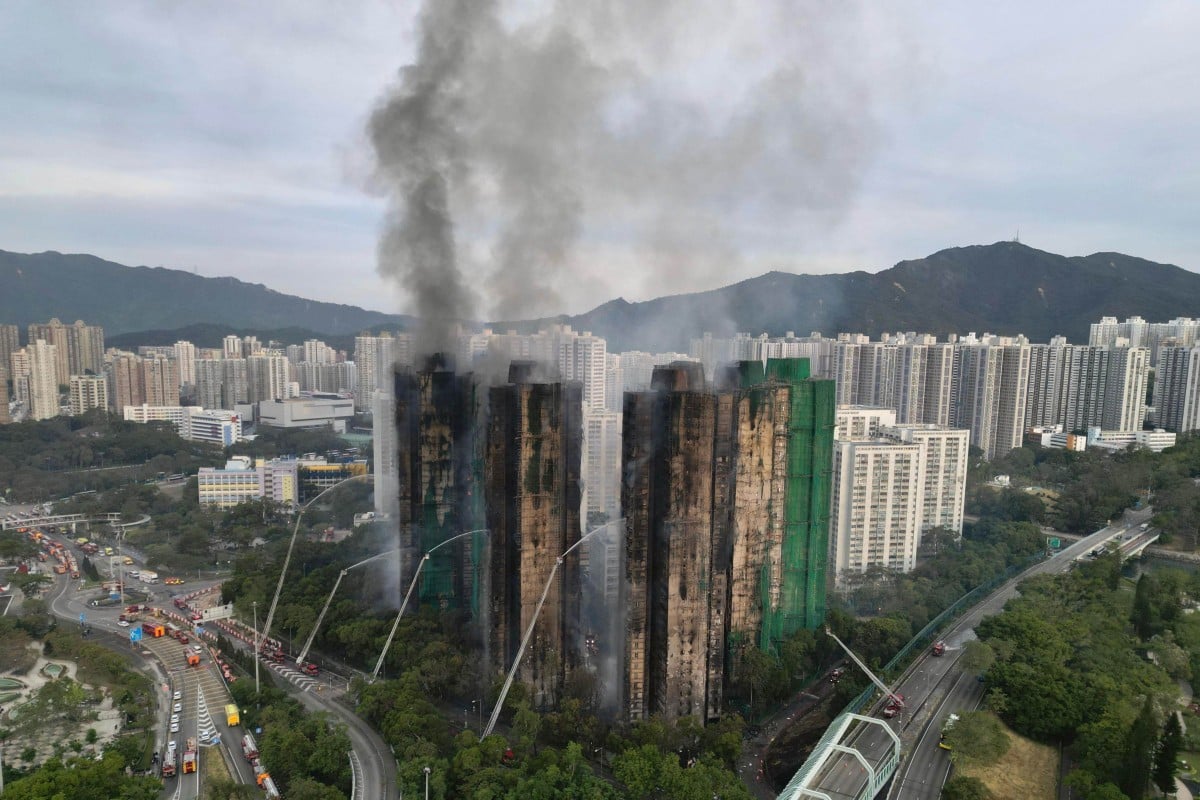 Firefighters continue to try and contain the fire at Wang Fuk Court in Tai Po. Photo: Karma Lo