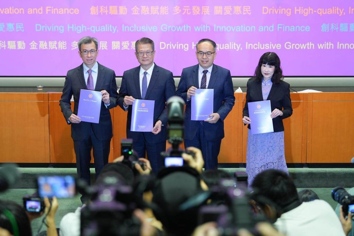 Finance minister Paul Chan (second from left). Photo: Eugene Lee