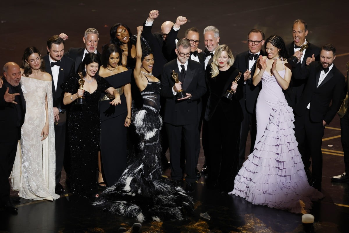 Paul Thomas Anderson (centre) and producer Sara Murphy (centre right) celebrate with the cast and crew onstage after winning the Oscar for best picture for One Battle After Another during the 98th Academy Awards at the Dolby Theatre in Los Angeles on 15 March, 2026. Photo: EPA
