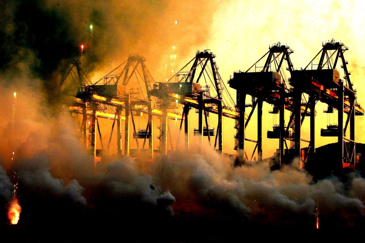 Quay cranes along a berth at the Yangshan deep-water port in Shanghai on September 14, 2011. Shanghai Zhenhua Heavy Machineries, established in 1992, has grown along with the explosive development of China’s ports to control 70 per cent of the global market for cranes, loaders and lifting equipment used in ports. Photo: Xinhua