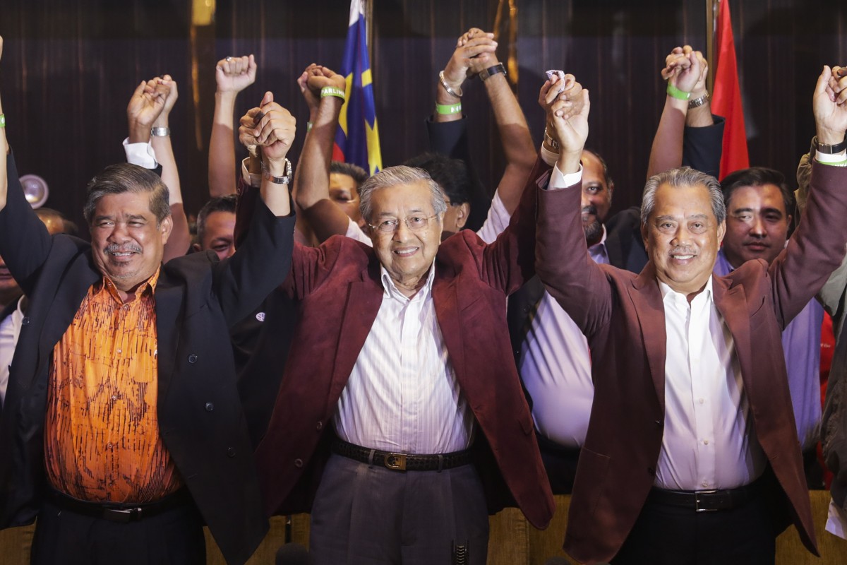 Malaysian Prime Minister Mahathir Mohamad (centre) and other members of Pakatan Harapan celebrate after last yearÃ¢Â€Â™s elections. Photo: EPA