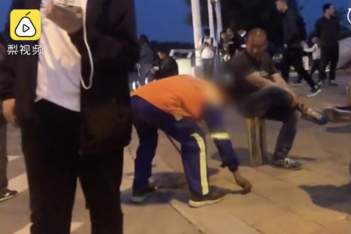 Local authorities say a street cleaner in Henan province fined for the cigarette butts left by smokers on his beat may be the victim of a zealous supervisor. Photo: Weibo