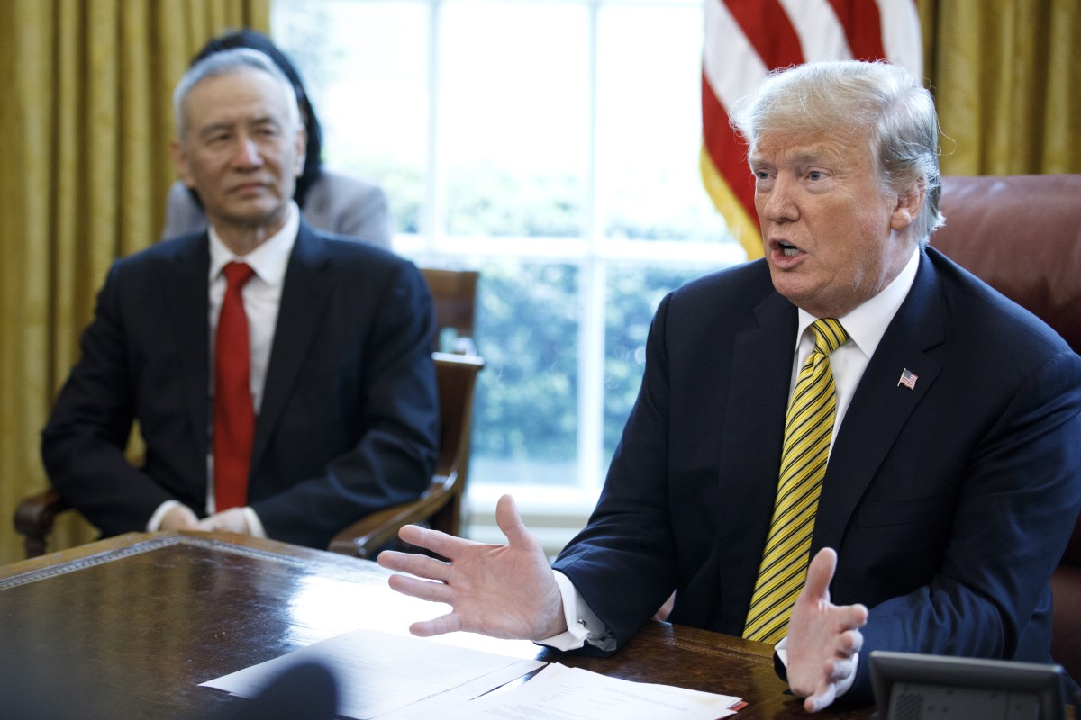 Chinese Vice-Premier Liu He with US President Donald Trump inside the Oval Office of the White House in Washington in April. Photo: EPA