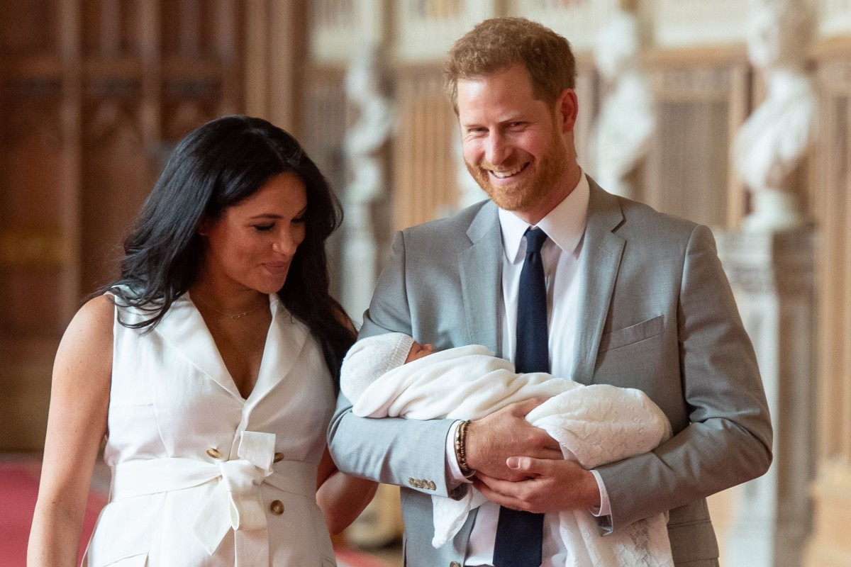 Britains prince harry and meghan duchess of sussex hold their baby son photo