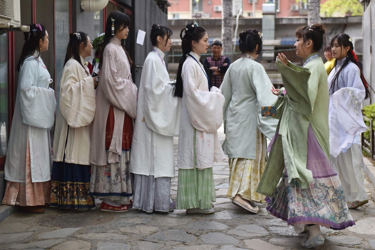 Women wear Han-style clothing in Beijing as part of April’s Traditional Chinese Costume Day celebration. Photo: AFP