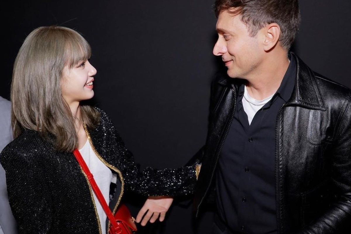 K-pop star Lisa of girl group, BLACKPINK, with designer Hedi Slimane at Celine’s menswear 2020 show at Paris Fashion Week on Sunday. Photo: Instagram@lalalalisa_m